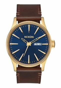 Nixon Sentry Leather Men's Watch - Polished Gold / Navy Sunray